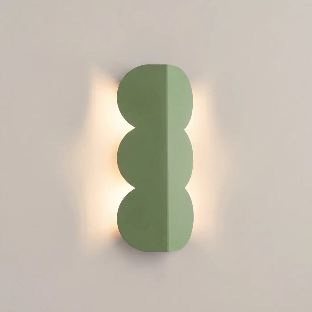 Applique murale BISCUIT sauge allumée, halo sur le mur
