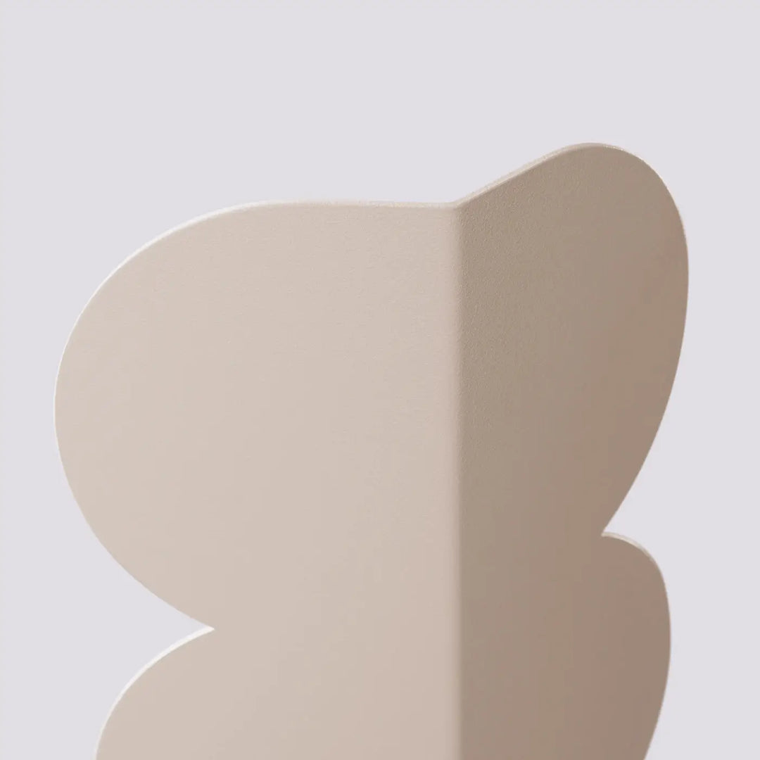 Applique murale BISCUIT taupe détail de la forme ondulée