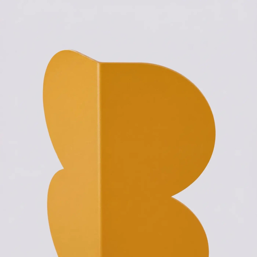 Applique murale BISCUIT jaune détail de la forme ondulée