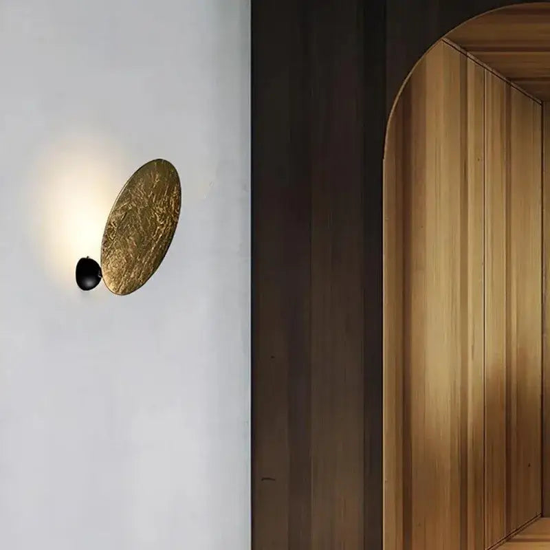 Applique murale ronde LED dorée design effet lune
