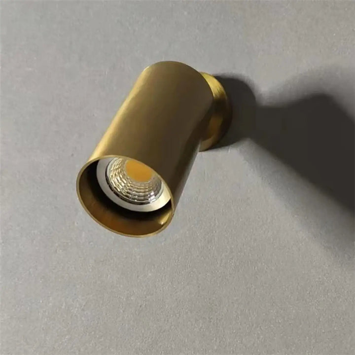 Applique murale cylindrique led finition or avec design moderne et épuré modèle cylia