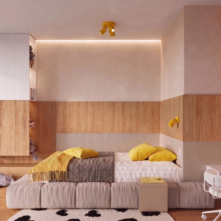 Applique murale Rayo en aluminium jaune à réflecteur rainuré dans une chambre