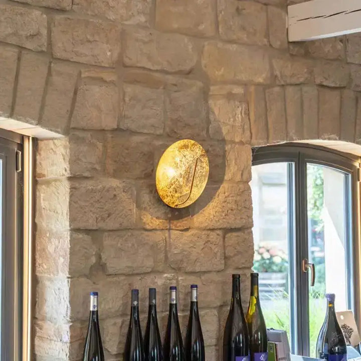 Applique murale style pleine lune pour une ambiance chaleureuse