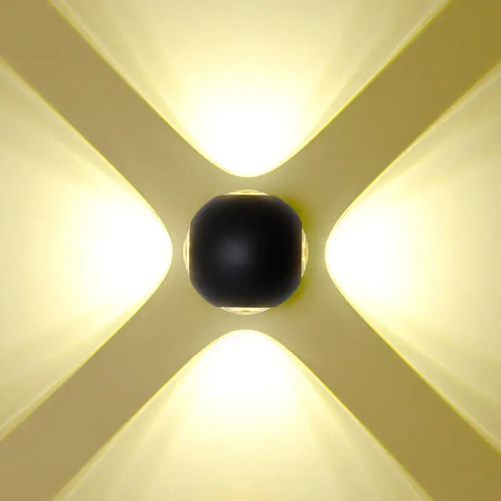 Applique murale extérieure ronde avec un éclairage bidirectionnel