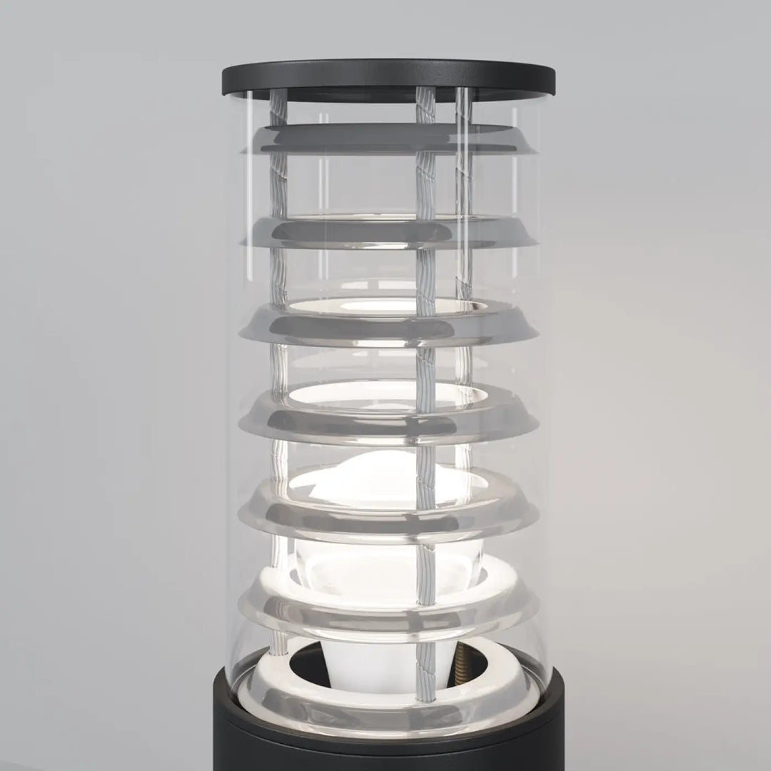 Borne extérieure bronx moderne avec verre transparent et structure métallique noire à anneaux superposés