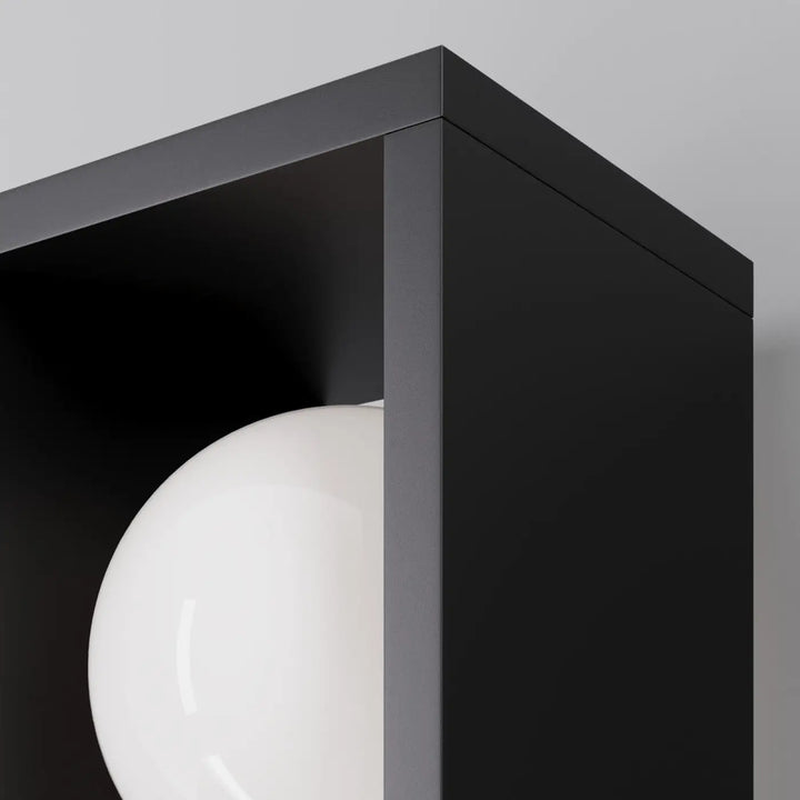 Borne extérieure led en acier noir avec finition mate et indice ip65 contenant une sphère blanche brillante