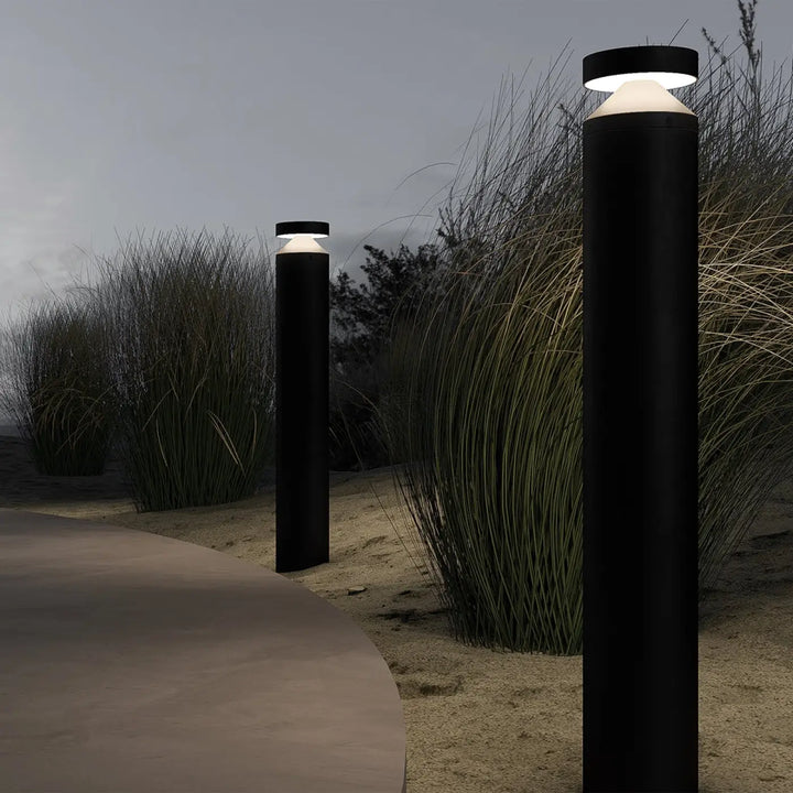 Borne extérieure cylindrique acier noir version basse avec éclairage led blanc chaud pour chemin extérieur moderne