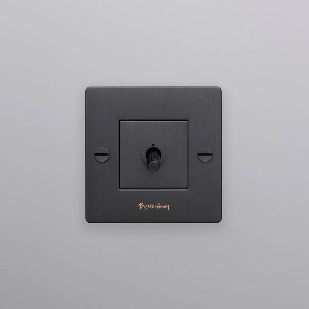Interrupteur à levier Toggle à gravure quadrillée bronze fumé #couleur_gris