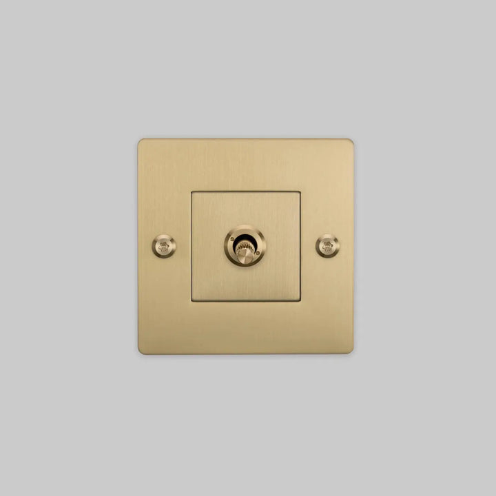 Interrupteur à levier Toggle à gravure alignée sans logo doré, finition laiton #couleur_dor