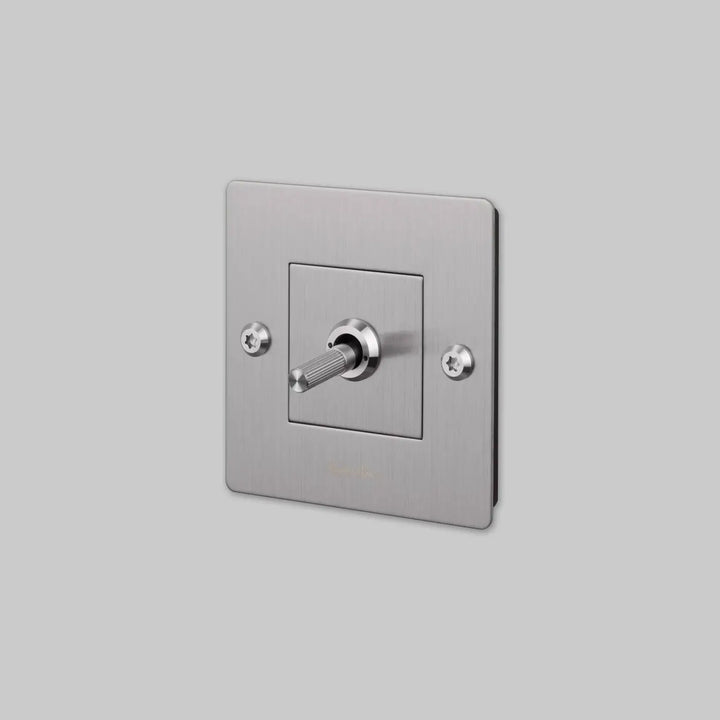 Interrupteur à levier Toggle à gravure alignée avec logo en acier #couleur_argent