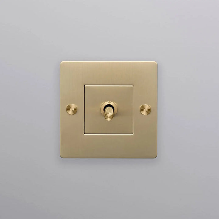 Interrupteur à levier Toggle à gravure quadrillée sans logo doré, finition laiton #couleur_dor