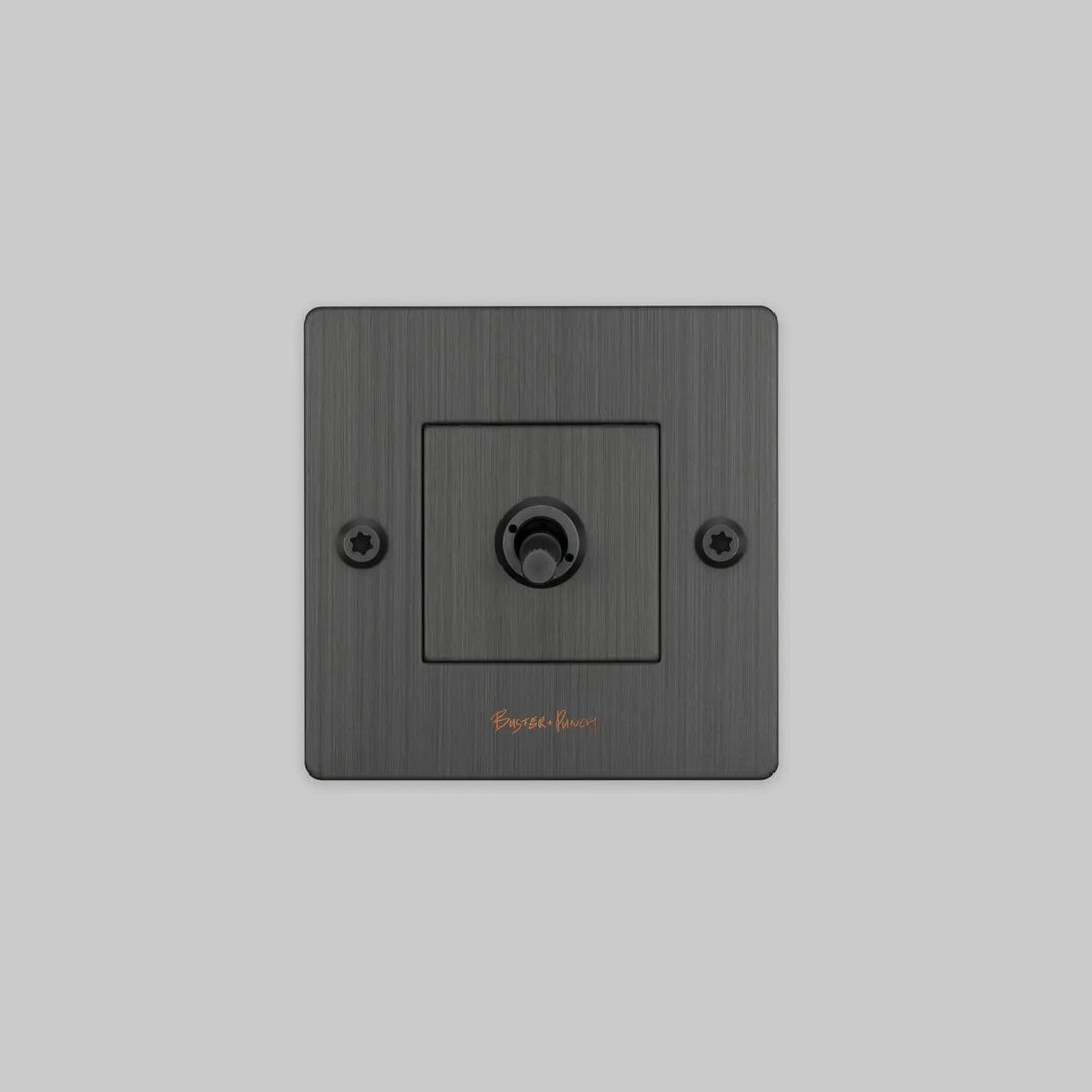 Interrupteur à levier Toggle à gravure alignée avec logo bronze fumé #couleur_gris