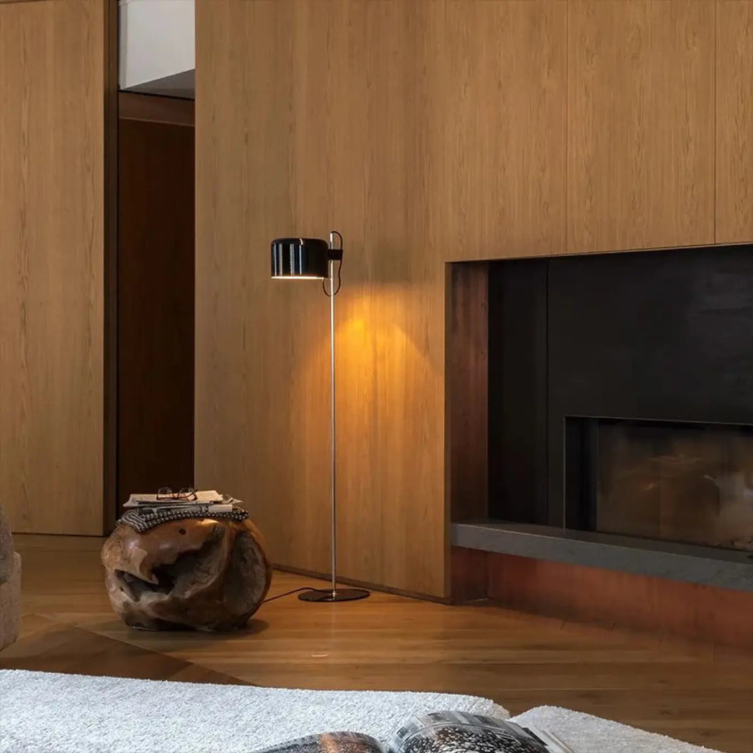 Lampadaire zelto noir cylindrique avec pied métallique fin pour un éclairage intérieur moderne