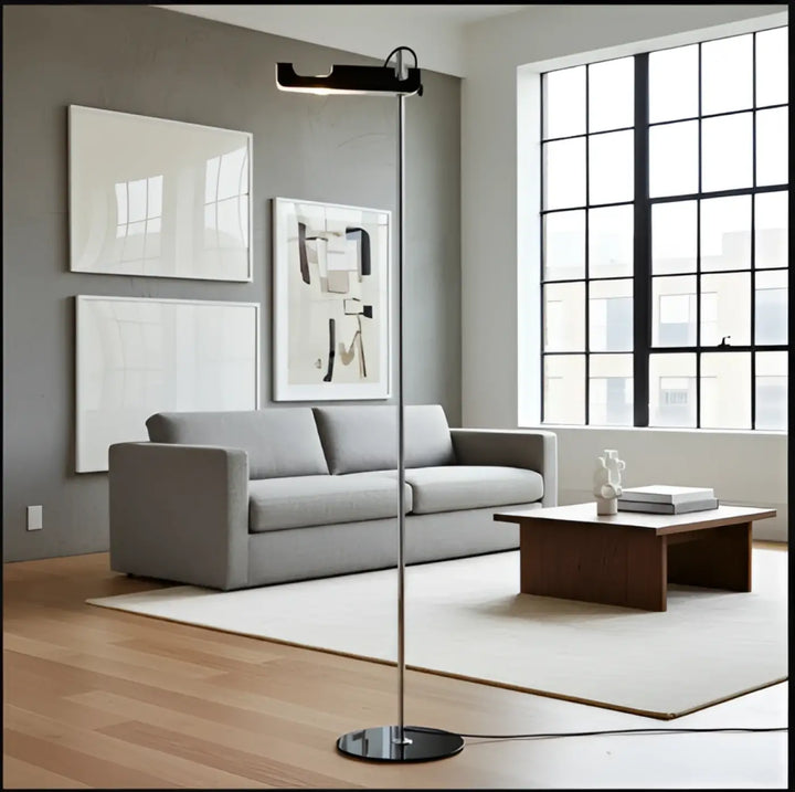 Lampadaire moderne orix avec structure fine noire en métal et éclairage directionnel design minimaliste élégant