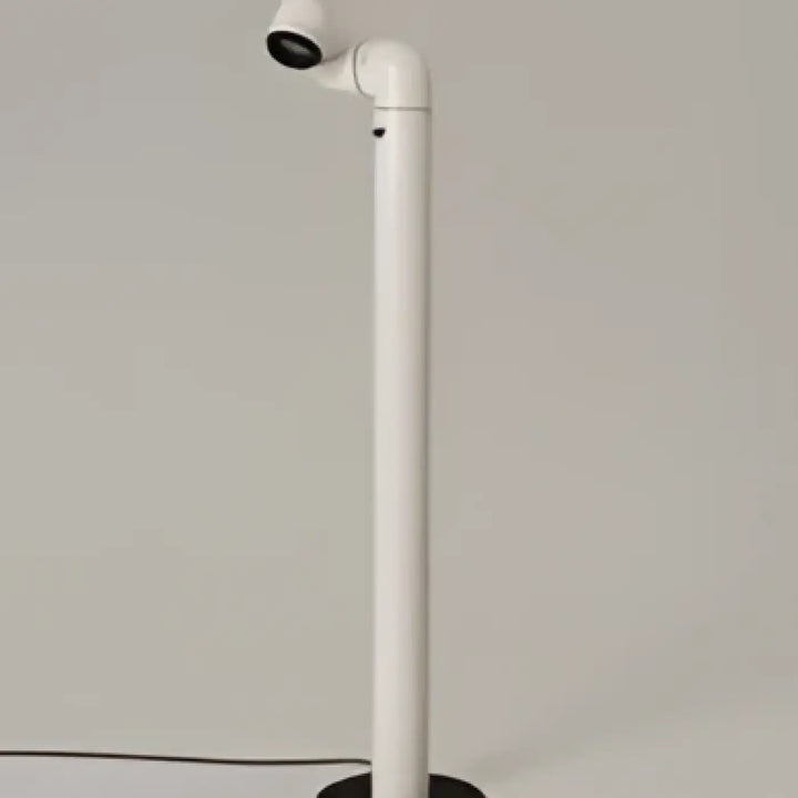 Lampadaire kalia blanc cylindrique avec bras réglable et lumière circulaire design rétro futuriste minimaliste