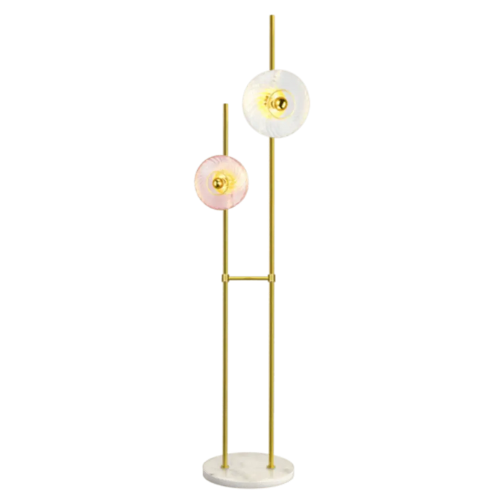 Lampadaire roxanne en ton or avec deux abat-jours circulaires blanc et rose sur socle marbre minimaliste