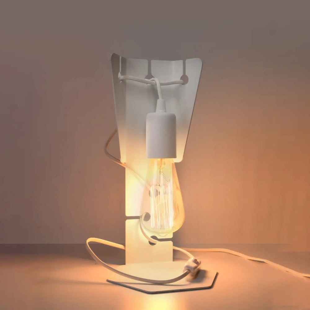 Lampe à poser blanc allumée