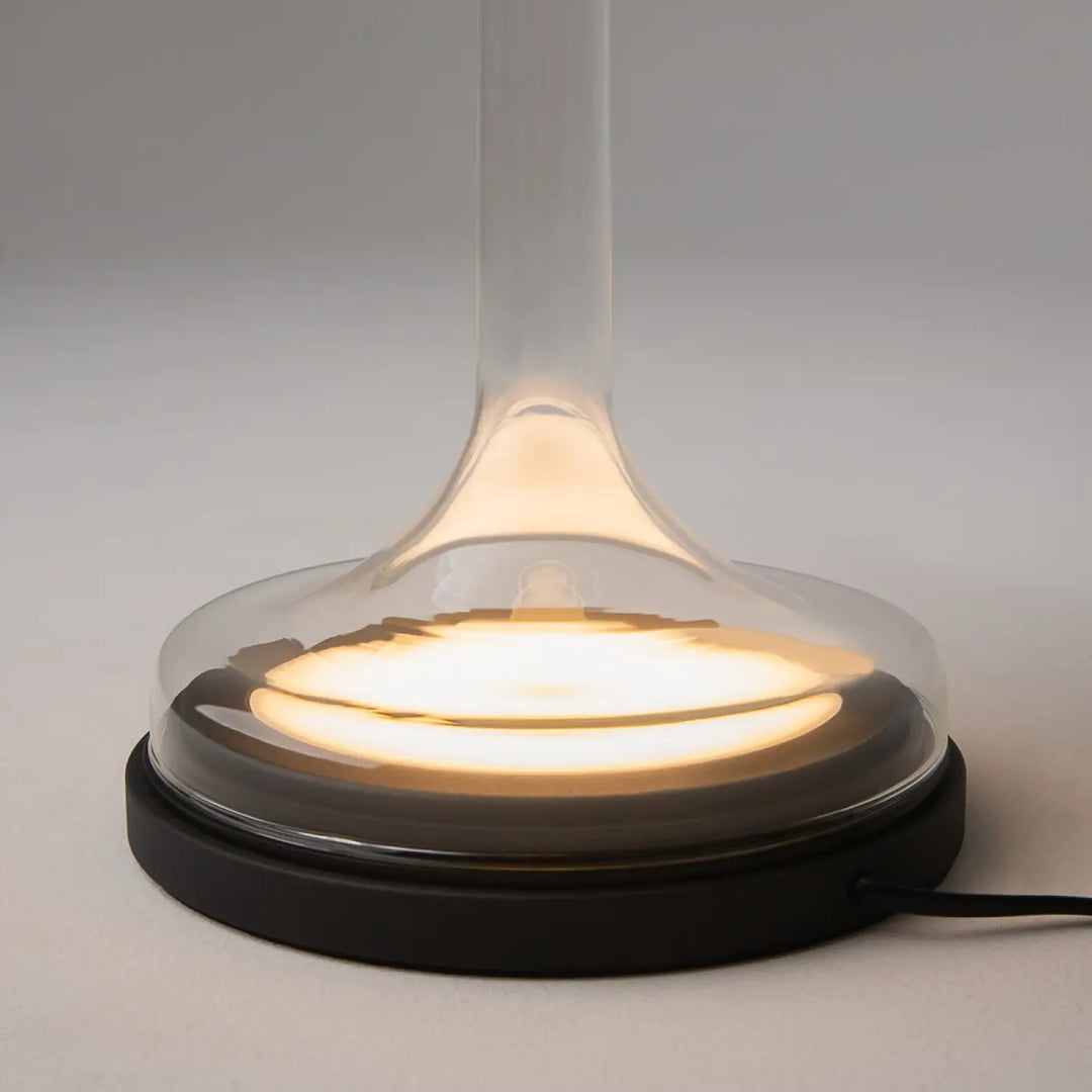 Lampe spirito lampe de chevet avec socle vertical en verre gris et lumière circulaire élégante sur base noire