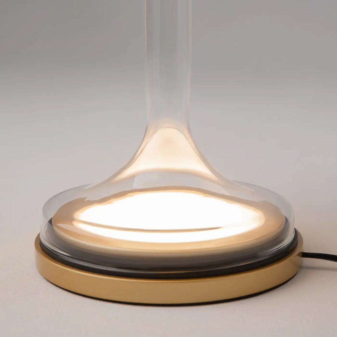 Lampe de chevet lampe spirito avec socle vertical en verre gris transparent et anneau métallique doré moderne
