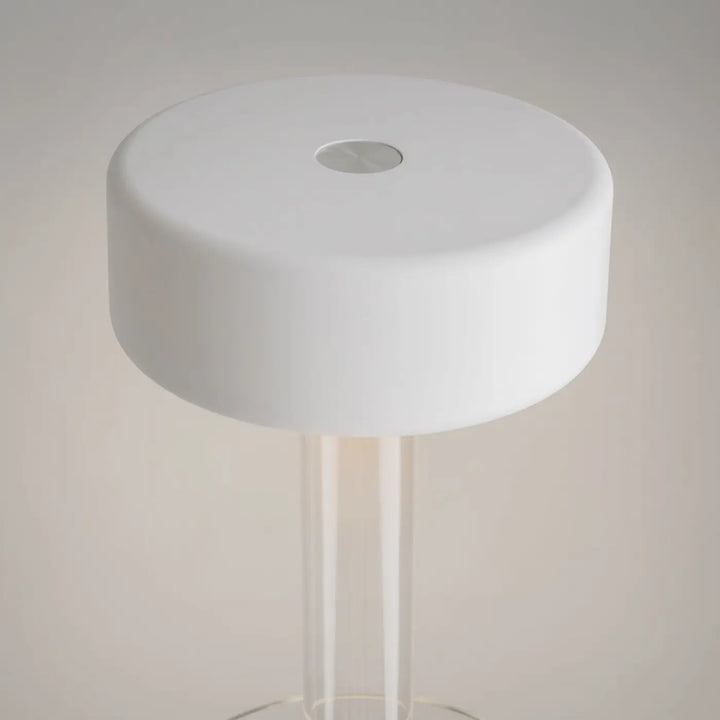 Lampe de chevet blanche cylindrique avec finition mate et pieds en acrylique transparent, lumière led dimmable rechargeable