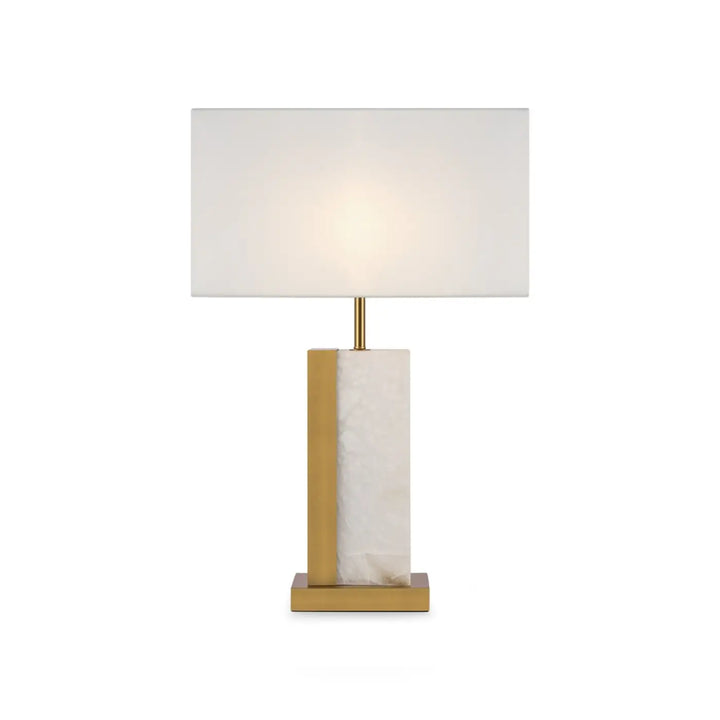 Lampe de chevet bianco avec abat-jour rectangulaire en tissu blanc et base en marbre texturé avec lumière douce