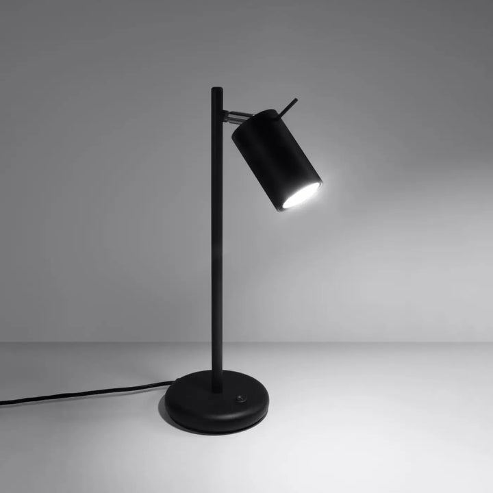 Lampe de table noir avec bras ajustable et base circulaire conçue pour un bureau ring et une décoration d’intérieur moderne