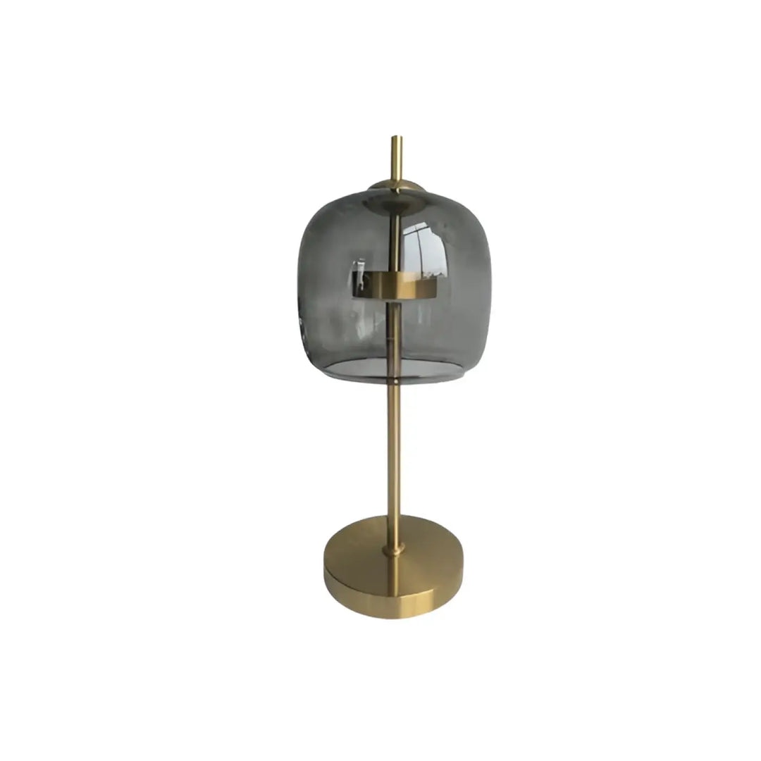 Lampe de table zelía avec dôme en verre transparent fumé et base en métal doré pour un table design moderne