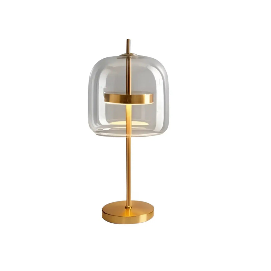 Lampe de table zelía en métal doré avec verre transparent et anneau central en laiton pour un design moderne