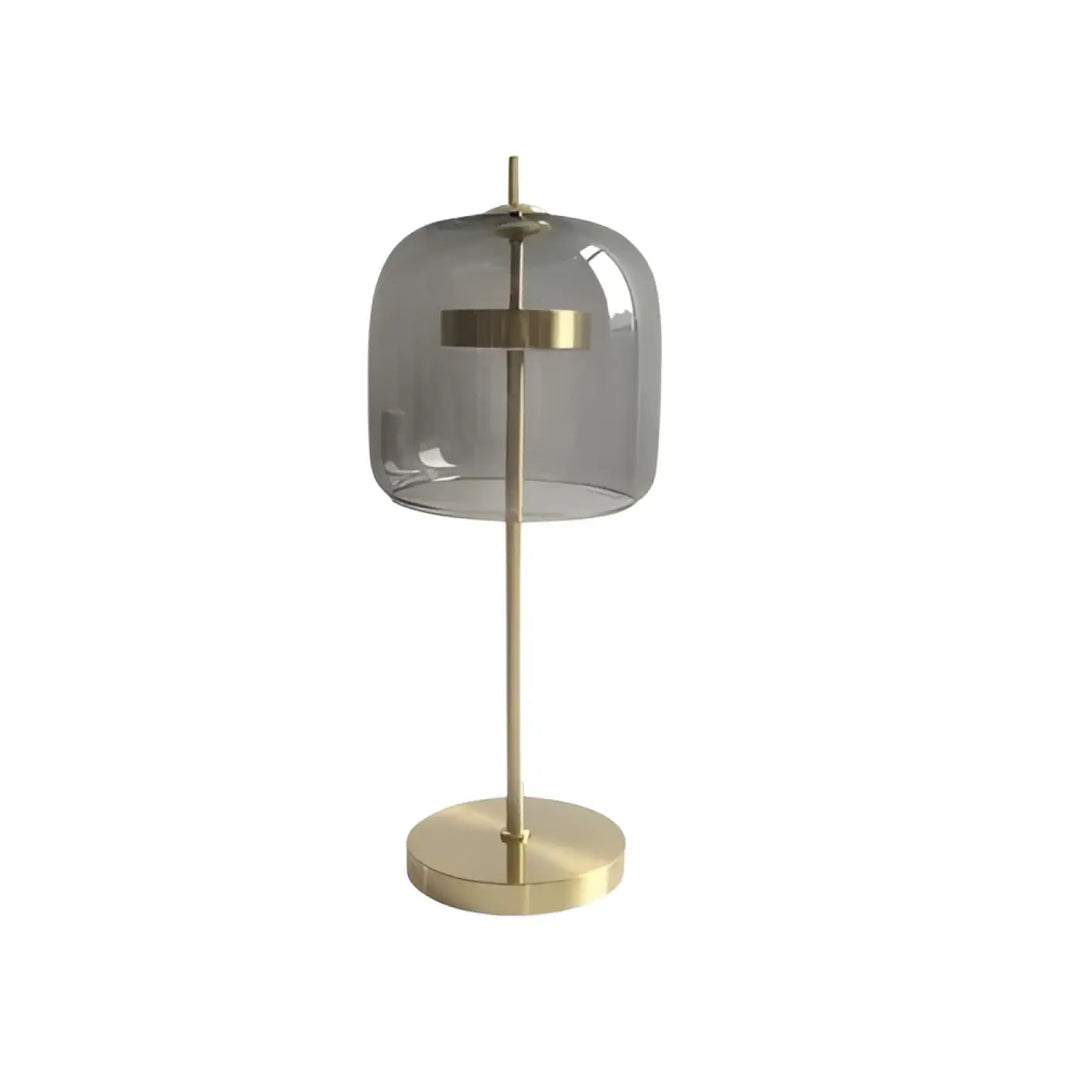 Lampe de table zelie avec dôme en verre transparent gris et structure en métal doré pour table design moderne