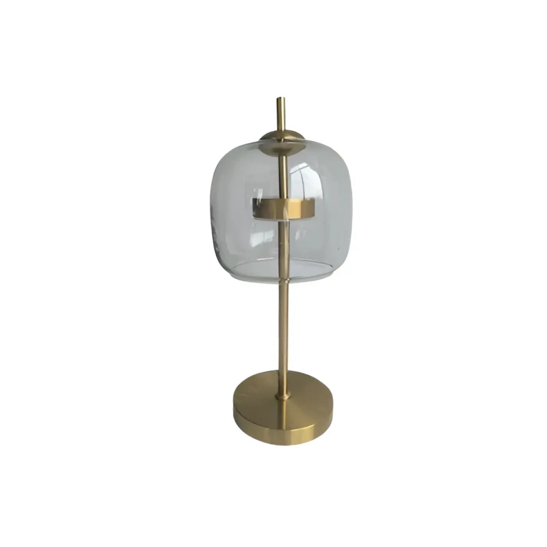 Lampe de table zelia avec verre transparent en forme de dôme et base en métal doré pour un design de table moderne