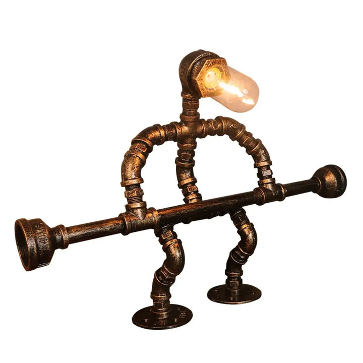 Lampe de table industrielle pipe robot en finition laiton avec ampoule apparente modele ironix