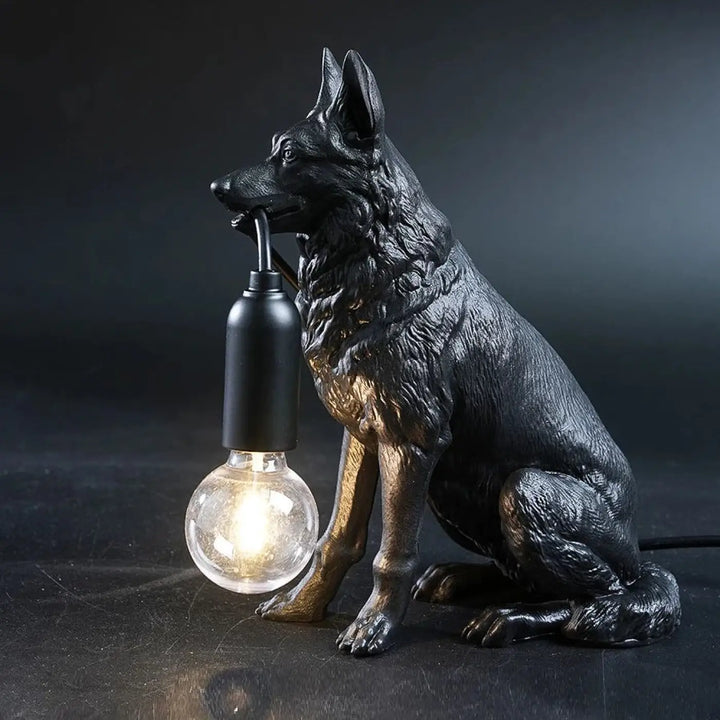 Lampe de table kanis berger allemand lumineux noir et bronze tenant une ampoule allumée pour une table sculpturale