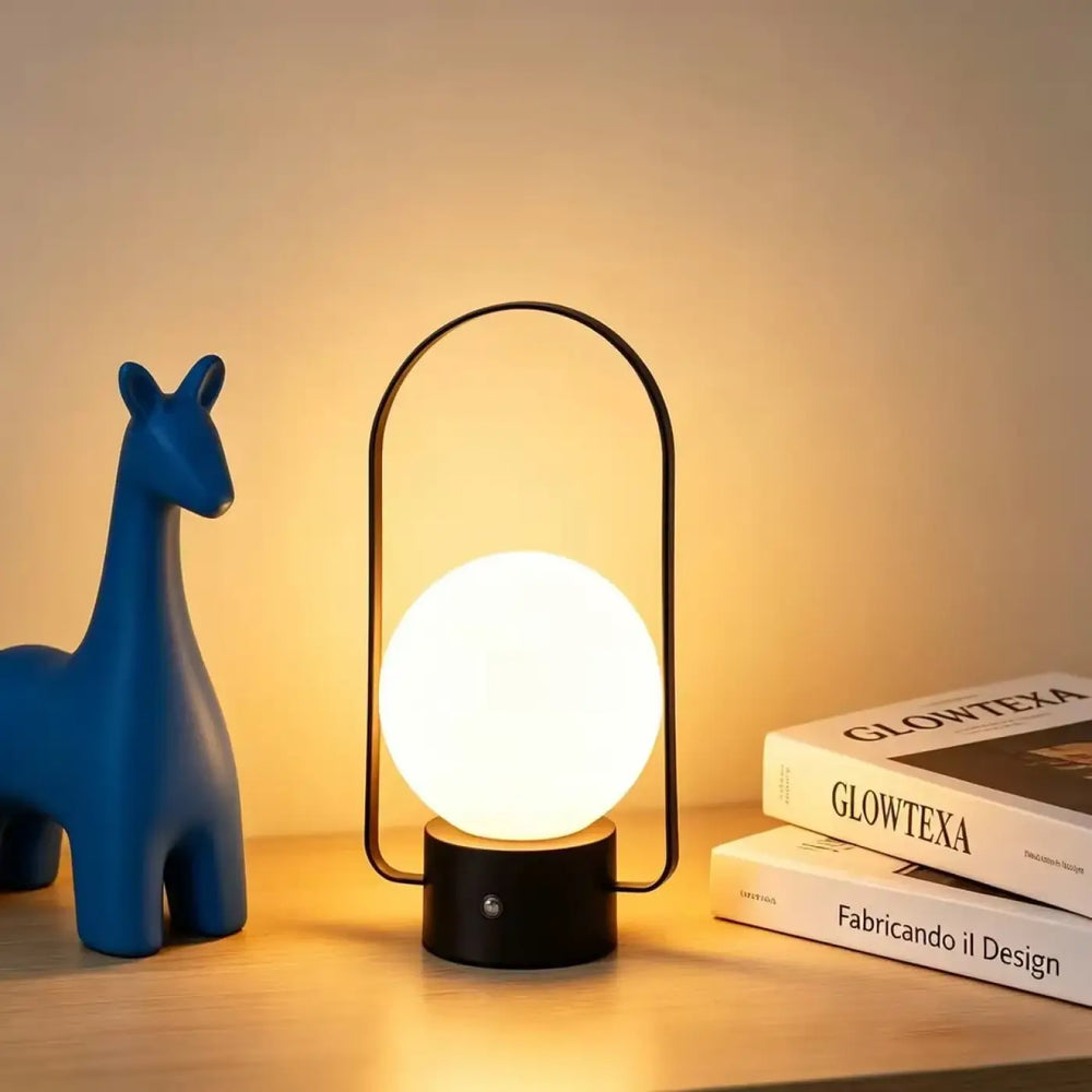 Lampe de table archelia avec sphère lumineuse blanche et arche métallique élégante en métal noir moderne