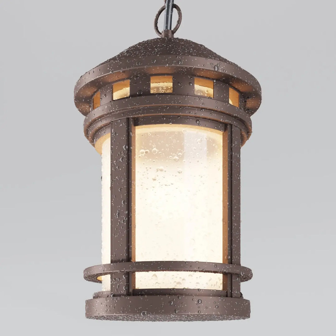 Lanterne suspendue salamanca bronze avec panneaux en verre texturé éclairage chaud pour aux porches