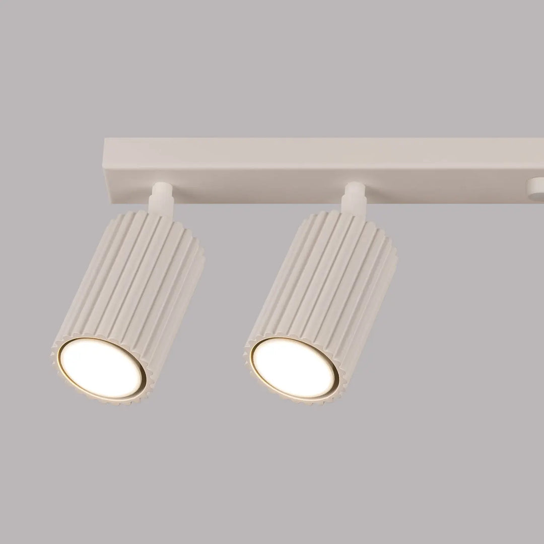 Plafonnier karbon allie blanc à tiges cannelées avec ampoules gu10 interchangeables design minimaliste beige