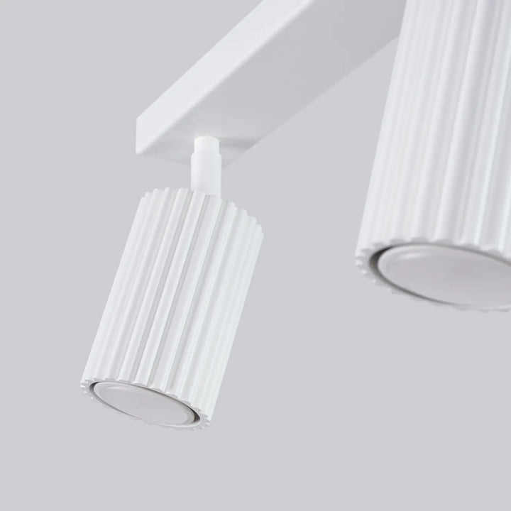 Plafonnier karbon blanc cylindrique avec ampoules gu10 interchangeables et design minimaliste verticalement rainuré