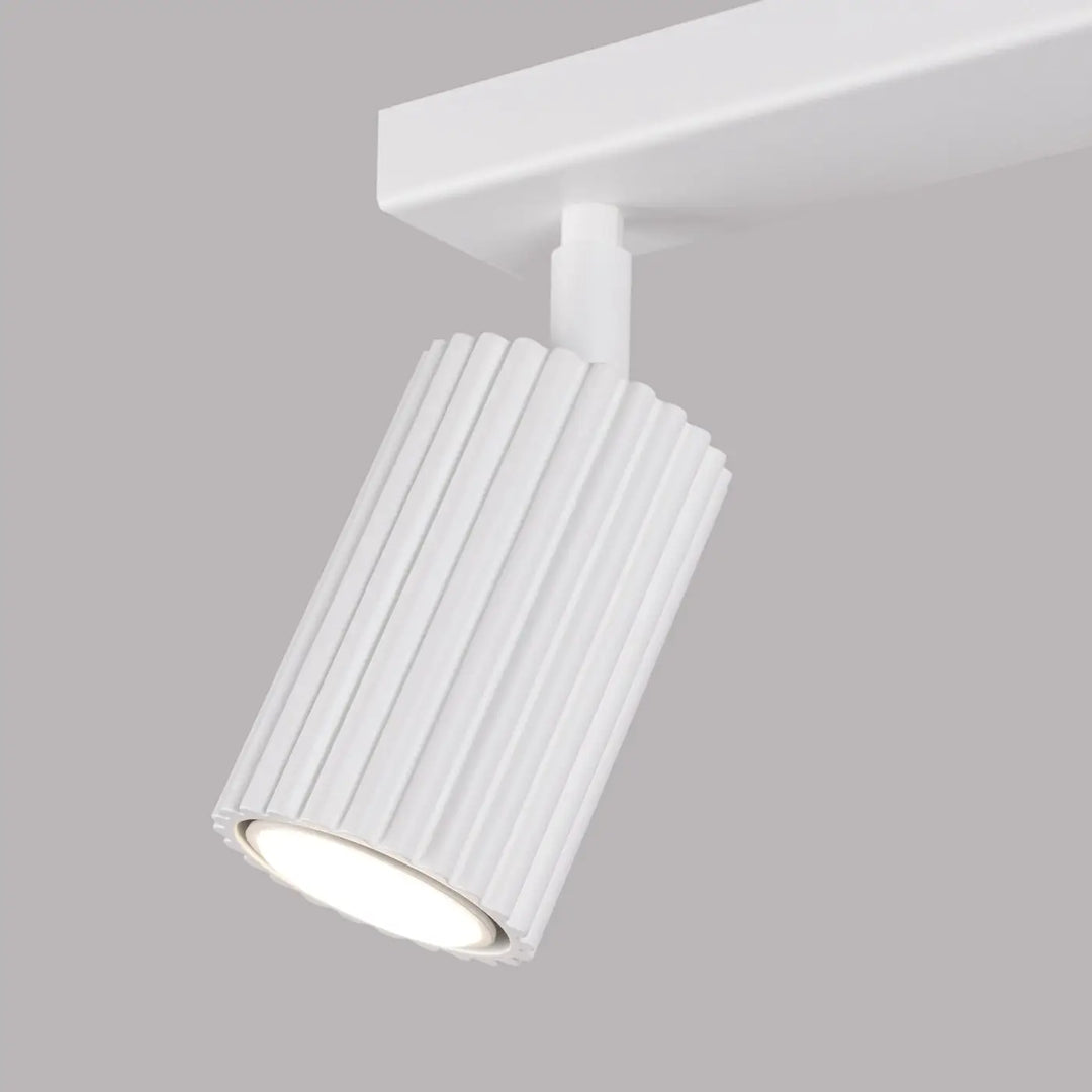 Plafonnier karbon blanc cylindrique à rainures verticales avec ampoules gu10 interchangeables design minimaliste