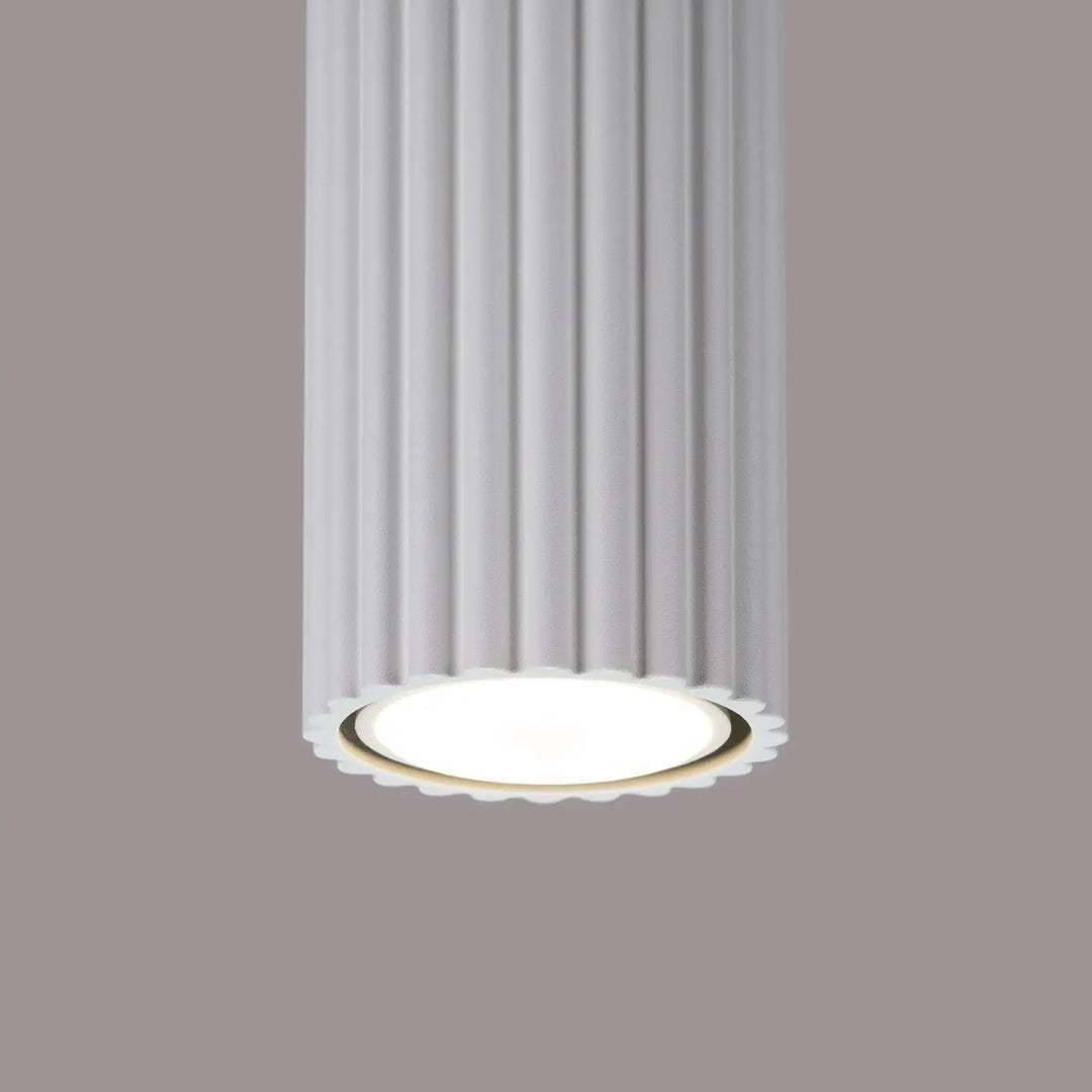 Plafonnier karbon blanc design minimaliste avec corps cylindrique cannelé et ampoules gu10 interchangeables led