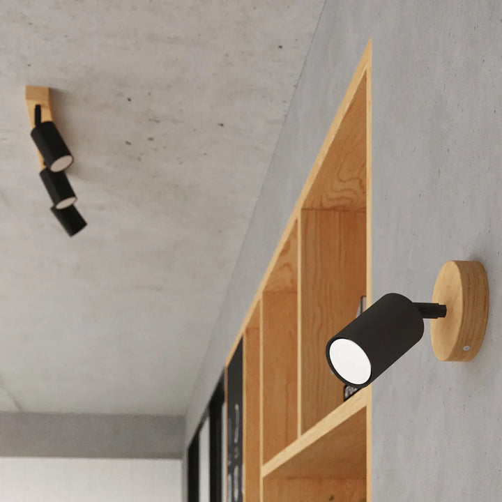 Luminaire plafonnier verdo 2 noir avec spot cylindrique mural noir et base en bois naturel design moderne