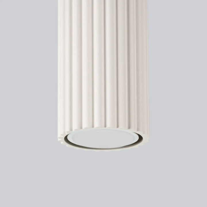 Plafonnier karbon beige en colonne cannelée avec panneau lumineux circulaire et ampoules gu10 interchangeables design minimaliste