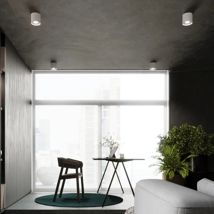Luminaire plafonnier mika blanc avec design cylindrique minimaliste pour un plafond mika moderne et mika allie simplicité