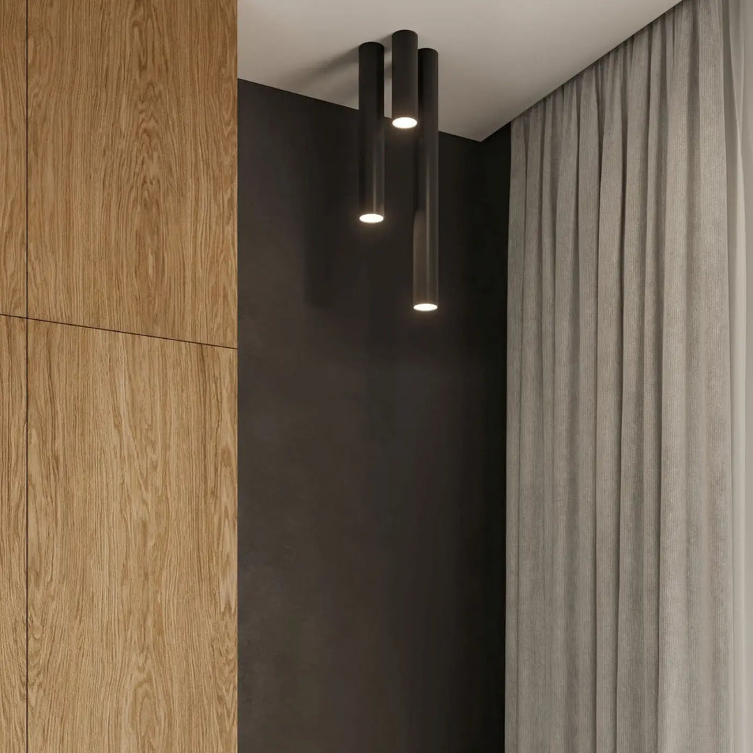 Plafonnier lagos 40 noir avec trois luminaires cylindriques élégance moderne et lumière fonctionnelle chaude