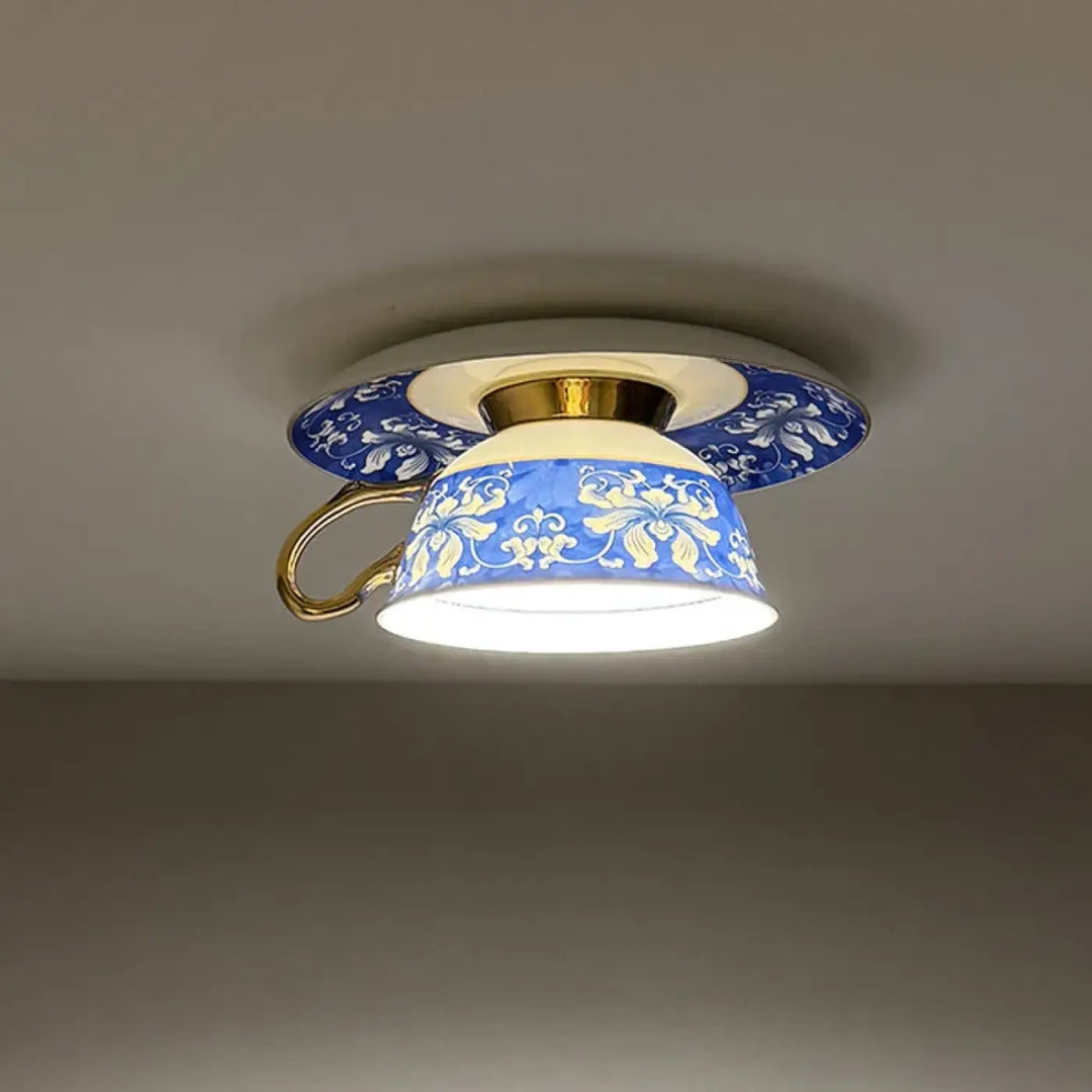 Luminaire plafonnier design en porcelaine bleue et blanche avec accents dorés modèle cafelia