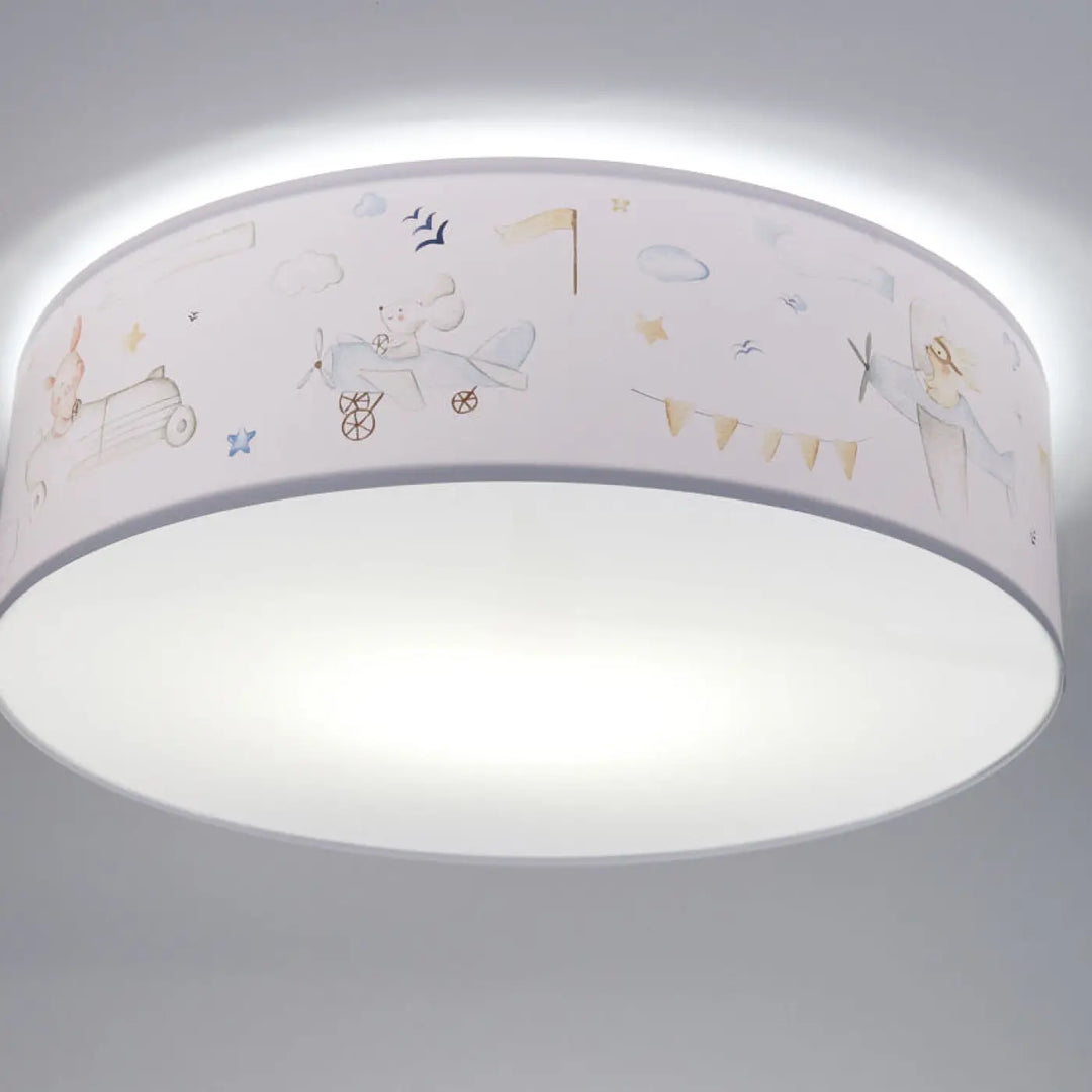 Luminaire plafonnier enfant blanc sweet dreams avec illustrations pastel d’avions, drapeaux et personnages whimsical