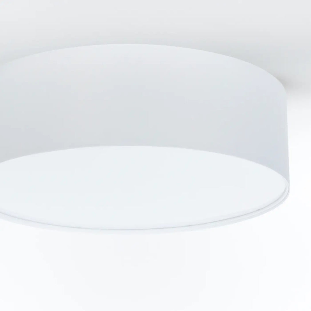 Luminaire plafonnier gris perle avec finition mate lisse en forme cylindrique blanche pour éclairage intérieur