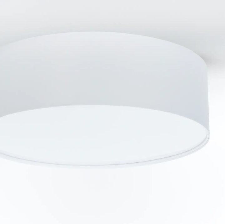 Luminaire plafonnier gris perle avec finition mate lisse en forme cylindrique blanche pour éclairage intérieur