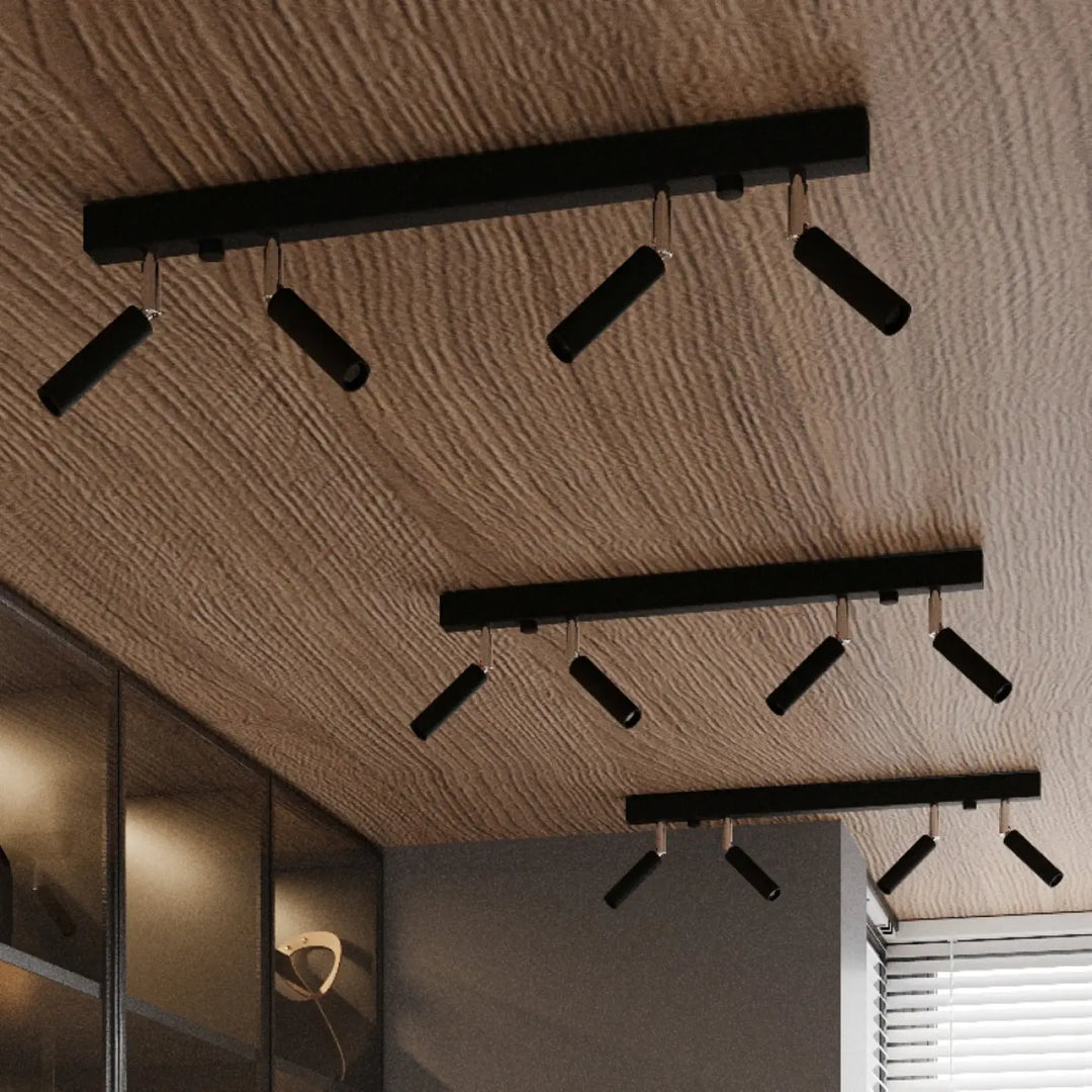 Luminaire plafonnier eyetech 2 noir avec spots ajustables monté sur plafond texturé style industriel d’ambiance loft