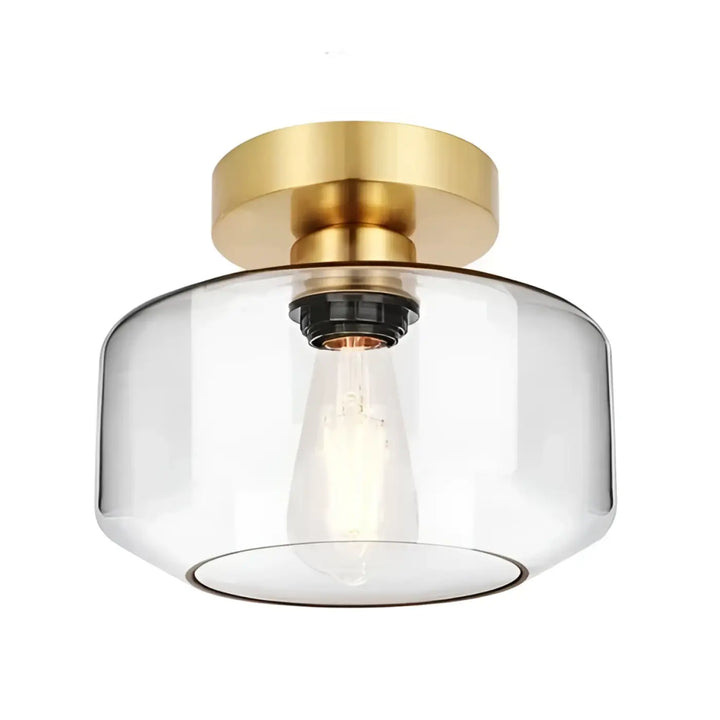 Luminaire plafonnier alto avec base en métal finition laiton et abat-jour en verre transparent avec ampoule apparente