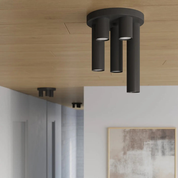 Plafonnier lagos 3p noir moderne avec trois bras verticaux cylindriques pour un caractère chic