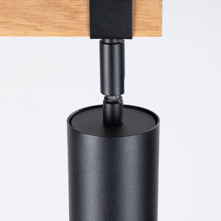 Luminaire plafonnier fager 4l noir avec lampe directionnelle fager et boîtier moderne en bois et métal mat